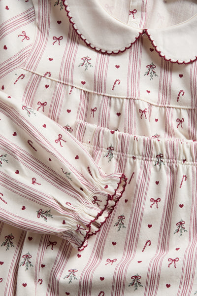 Kids white & red Christmas pyjamas with bows
