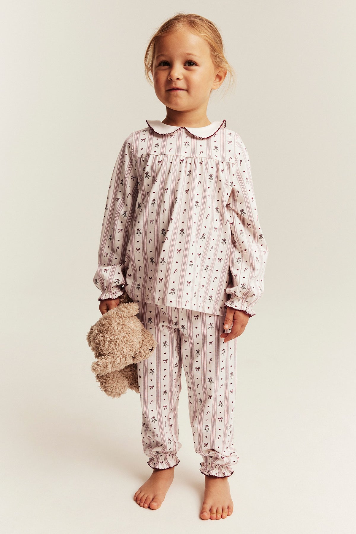 Kids white & red Christmas pyjamas with bows