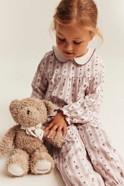 Kids white & red Christmas pyjamas with bows