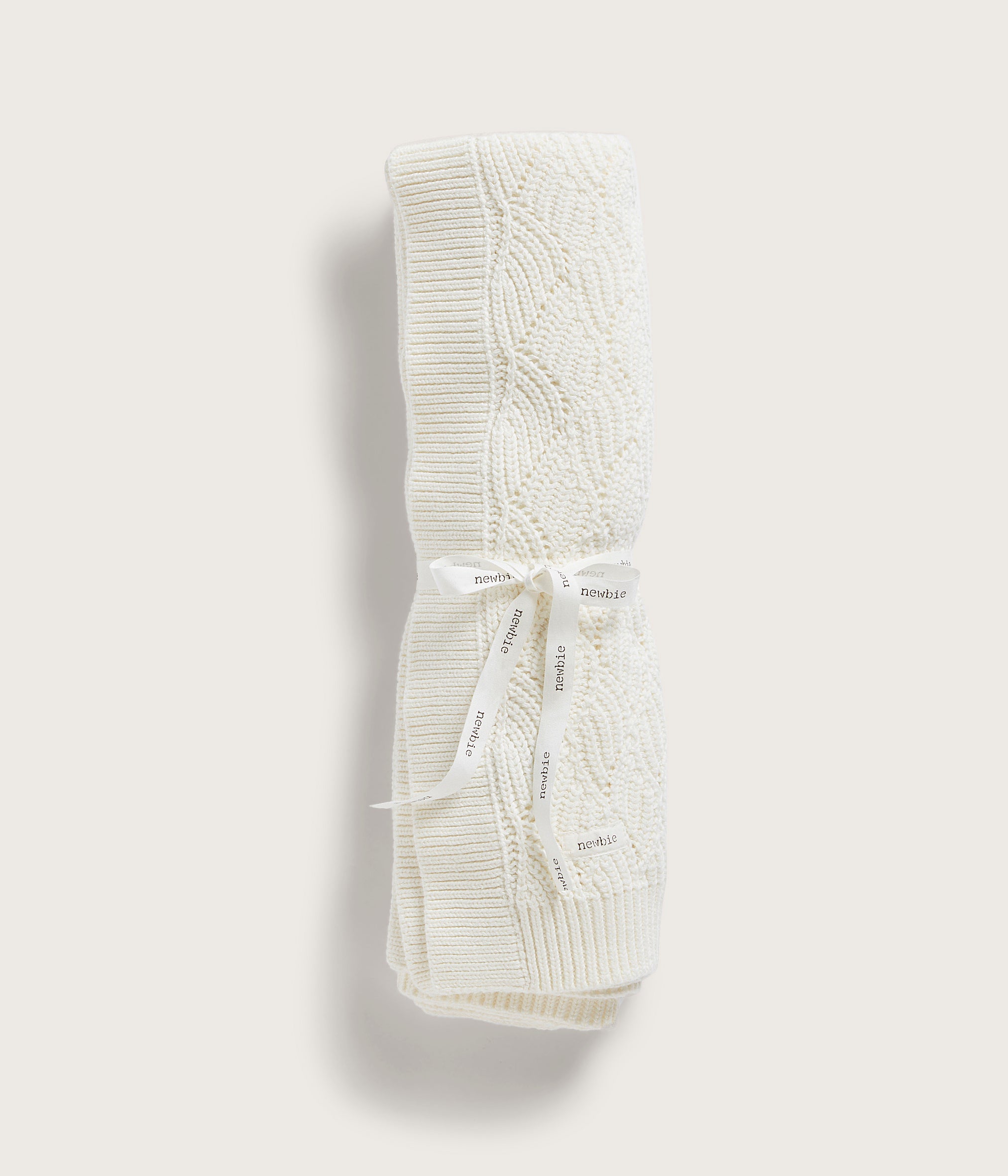 Beige pattern knitted blanket