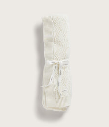 Beige pattern knitted blanket