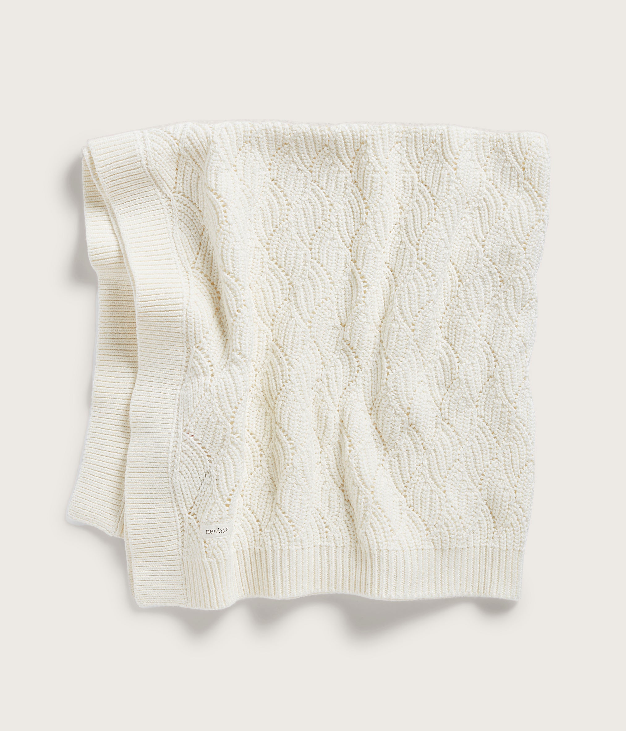 Beige pattern knitted blanket