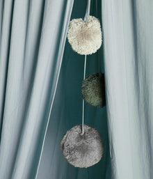 Baby blue play tent with pom-poms